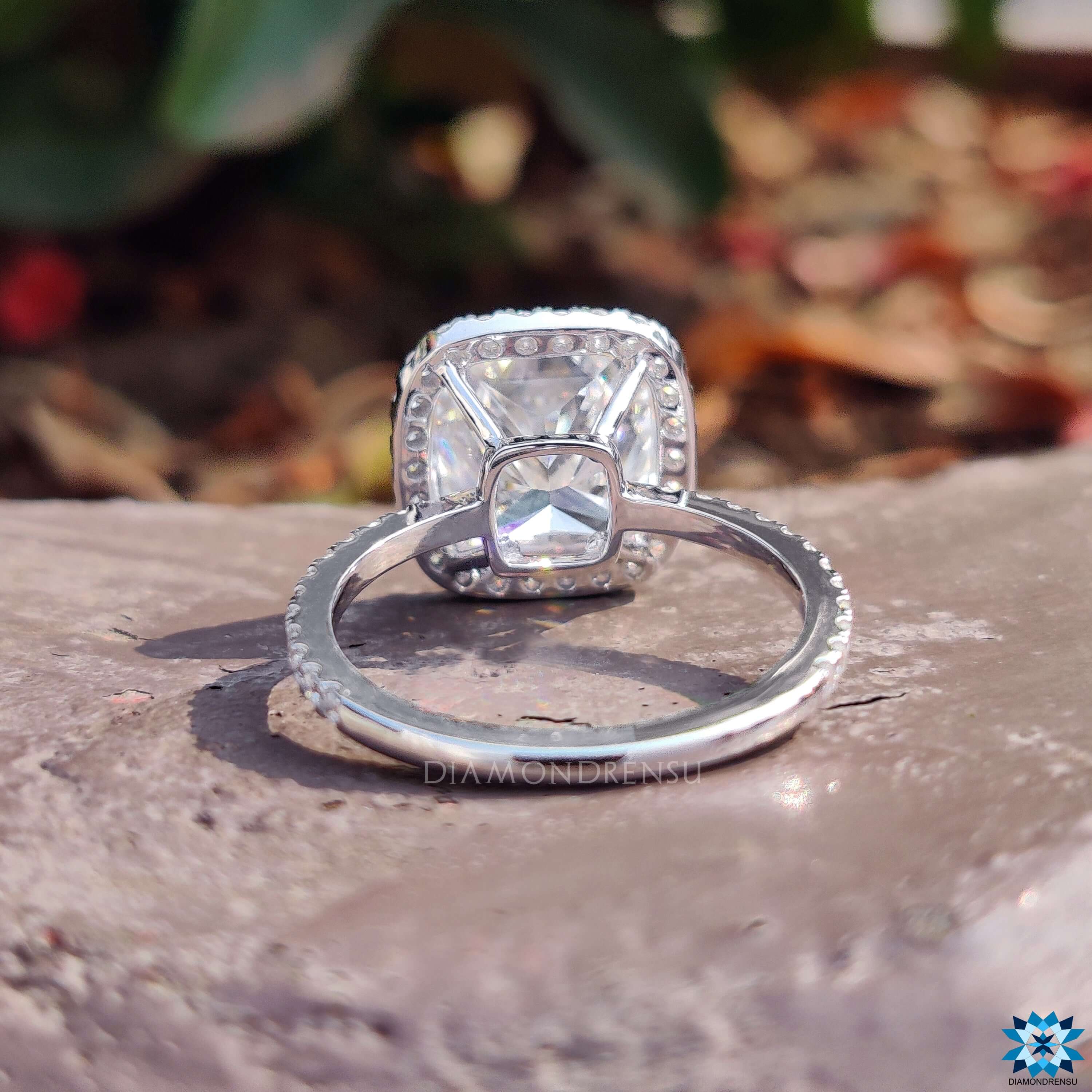 White gold engagement ring with cushion moissanite.