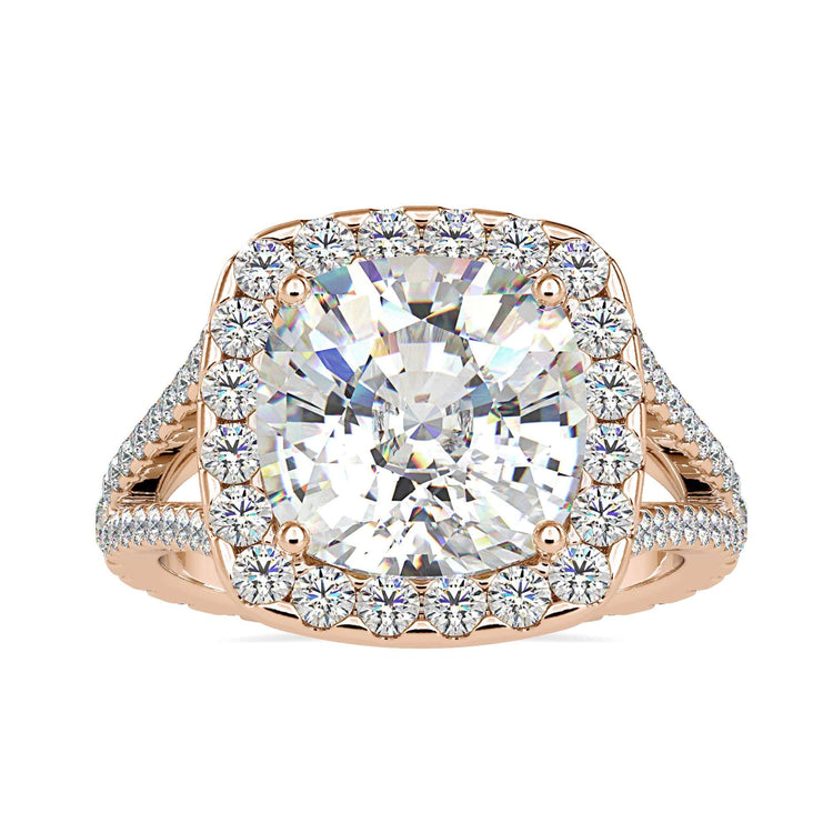 IGI certified cushion cut ring with round accents.
