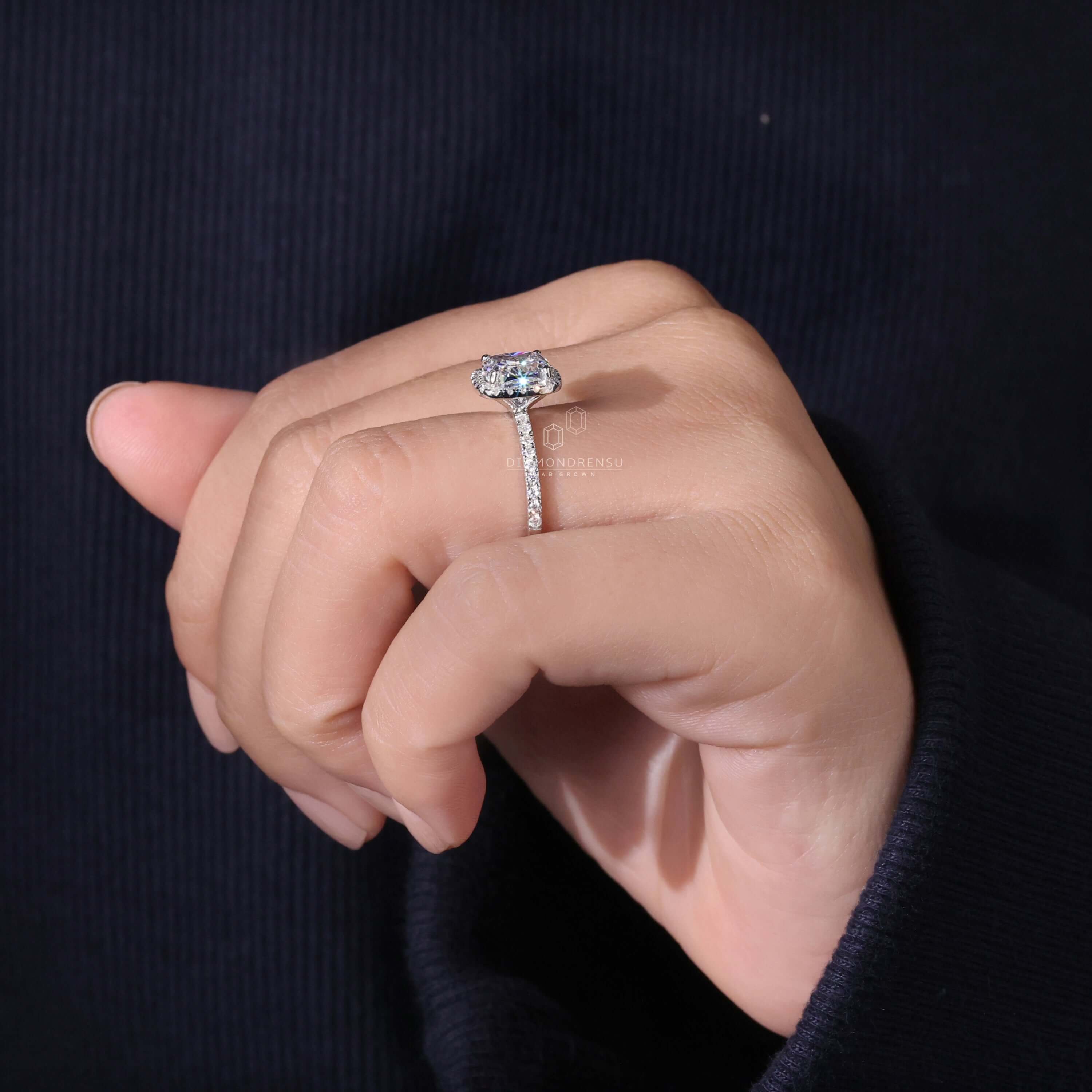 Cushion cut lab grown diamond ring featuring a halo design and handmade jewelry craftsmanship.