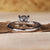 Cushion diamond in a claw prong setting, designed as a unique engagement ring for women who love timeless styles.
