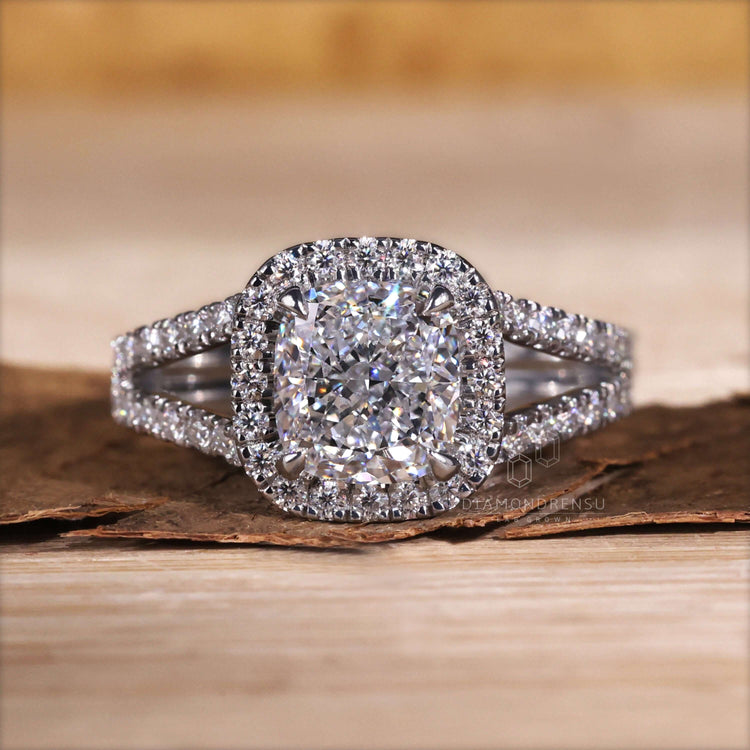 Cushion engagement ring with a halo ring setting for added sparkle.