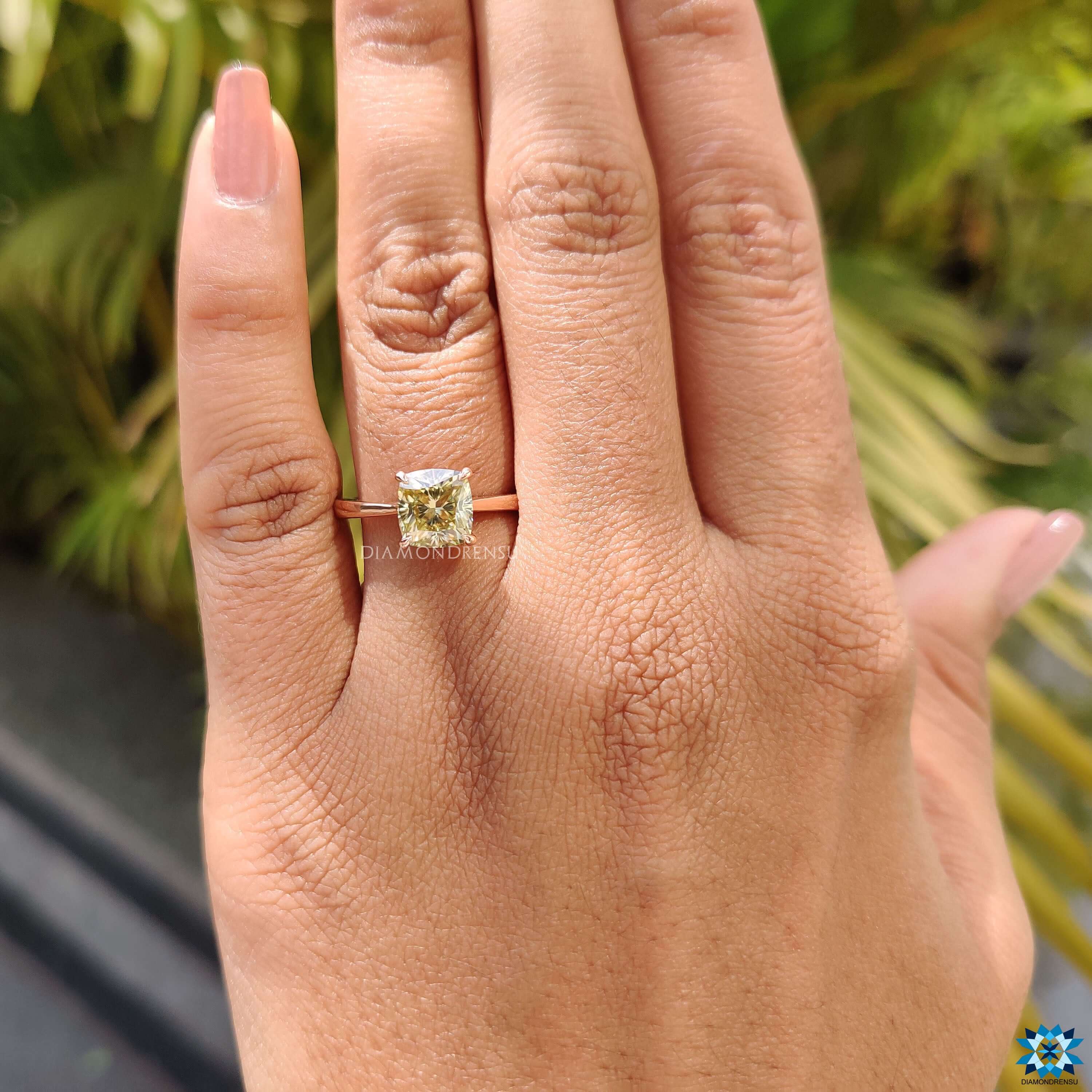Canary yellow moissanite set in a solitaire design.
