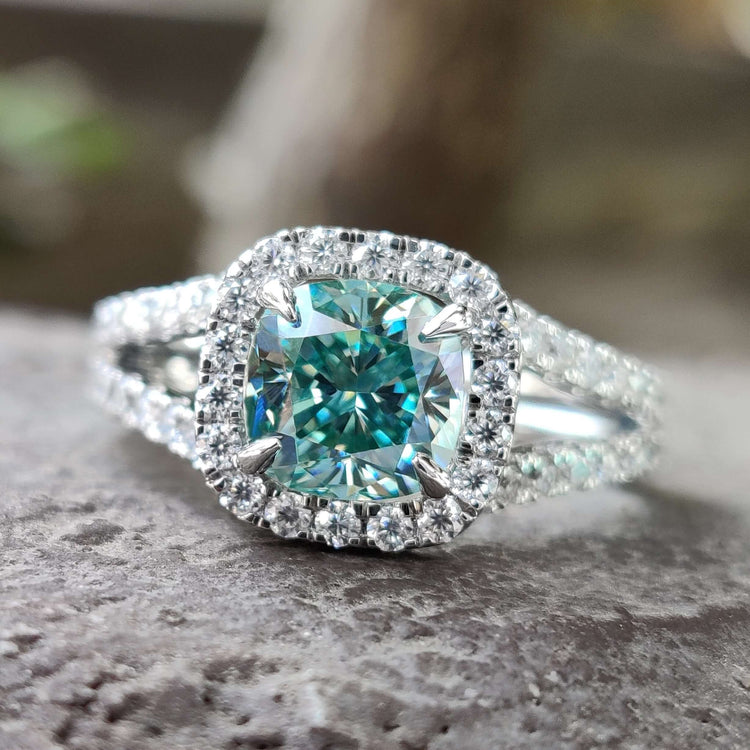 Cushion cut moissanite ring in white gold.