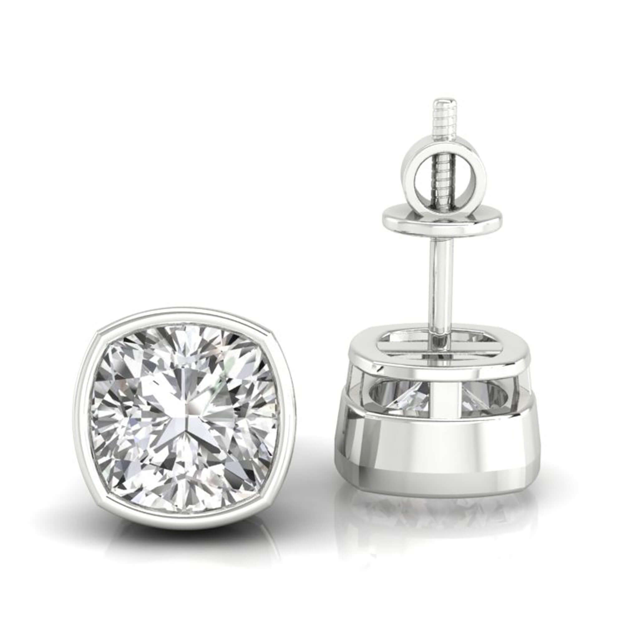 ushion cut diamond stud earrings set in bezel design.