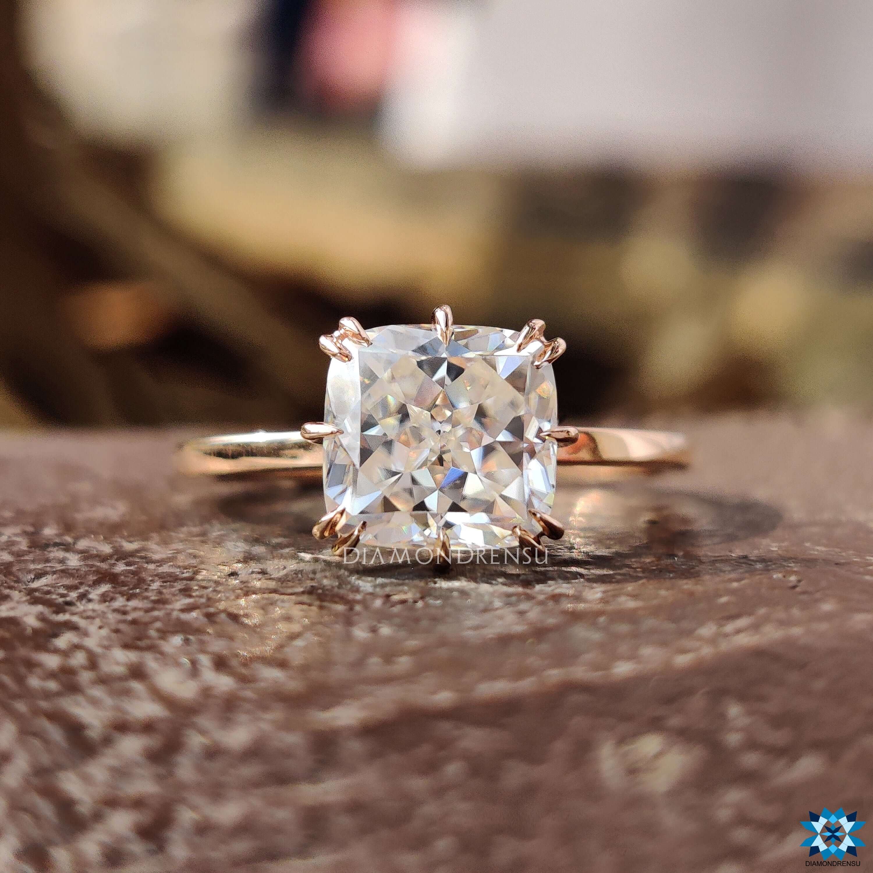 Handmade solitaire ring with compass prong setting.