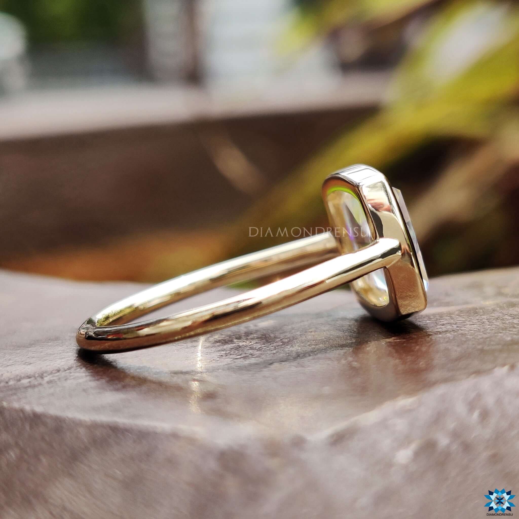 Cushion rose cut moissanite ring with bezel setting.