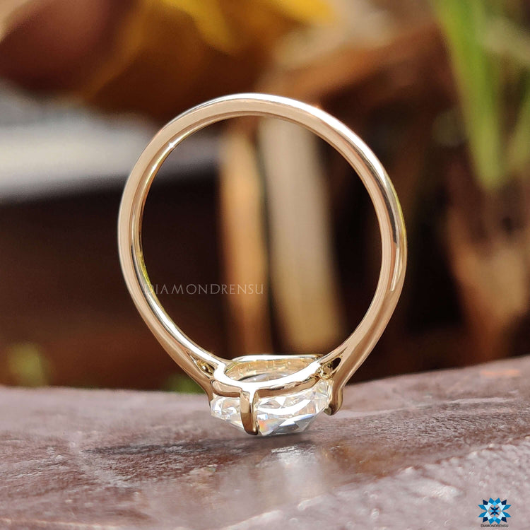 Compass prong setting for rose cut moissanite.