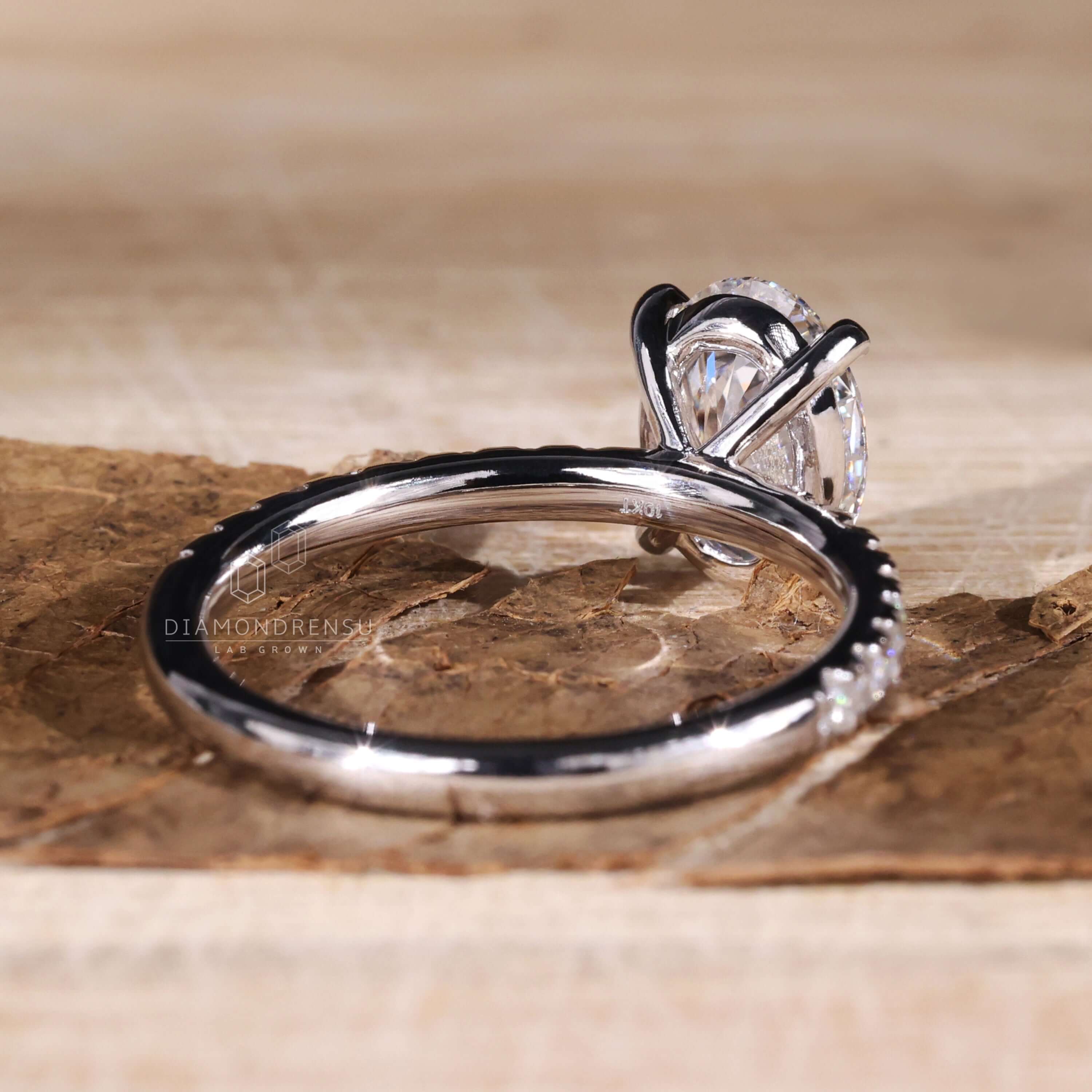 Oval diamond paired with an igi certified Lab Grown Diamond for ethical luxury.