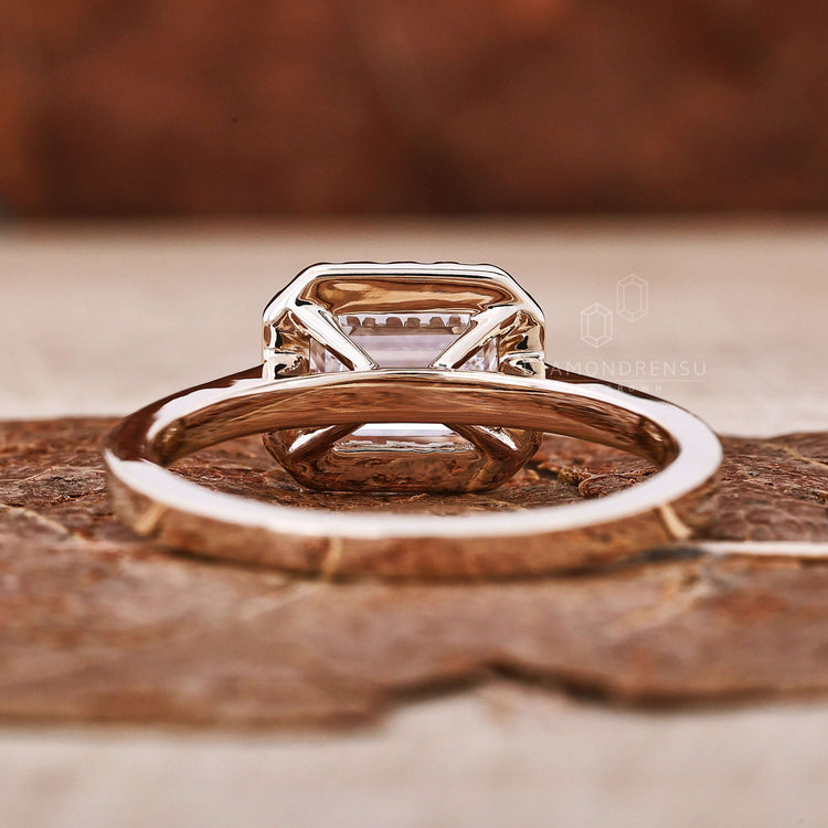 East west diamond ring featuring a sleek and sophisticated design.