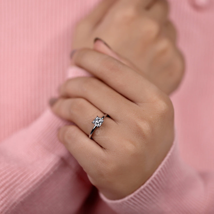 Cushion engagement ring designed with a sleek prong setting.