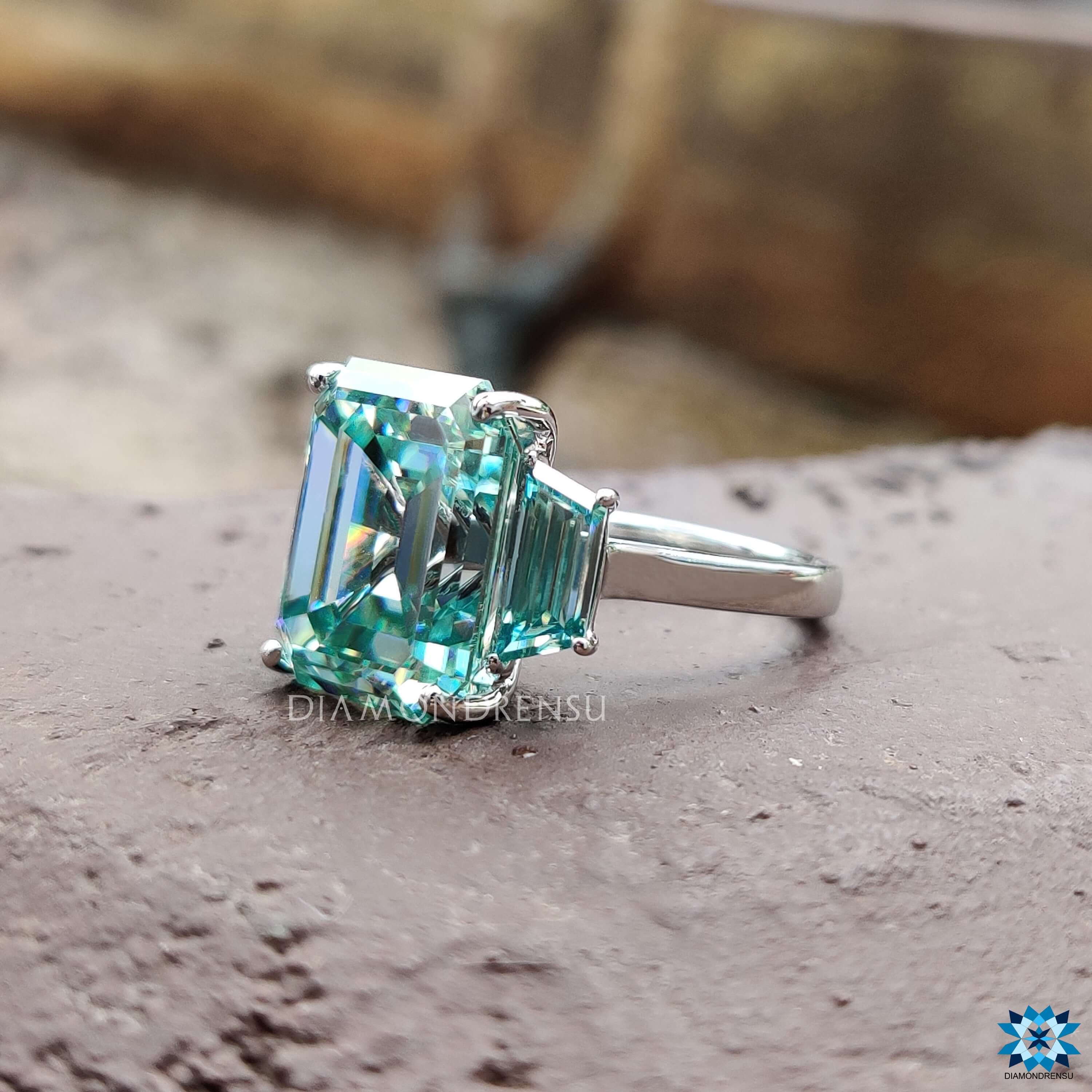 Custom moissanite engagement ring in white gold.