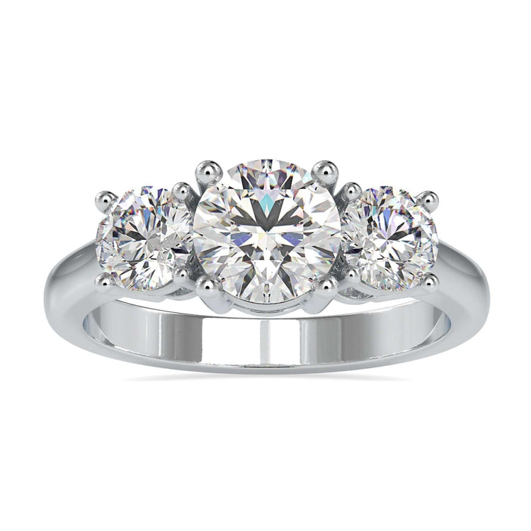 Three stone engagement ring in yellow gold with round cut diamonds.