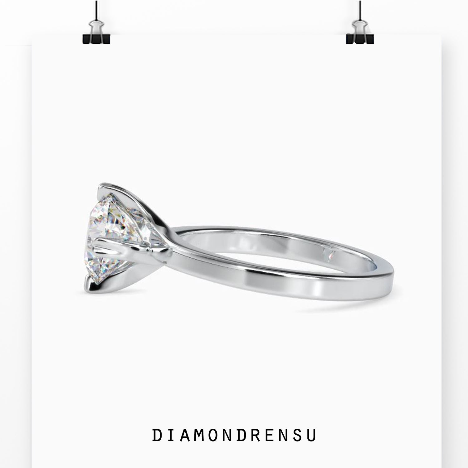 White gold diamond ring with heart prong, handmade finish.