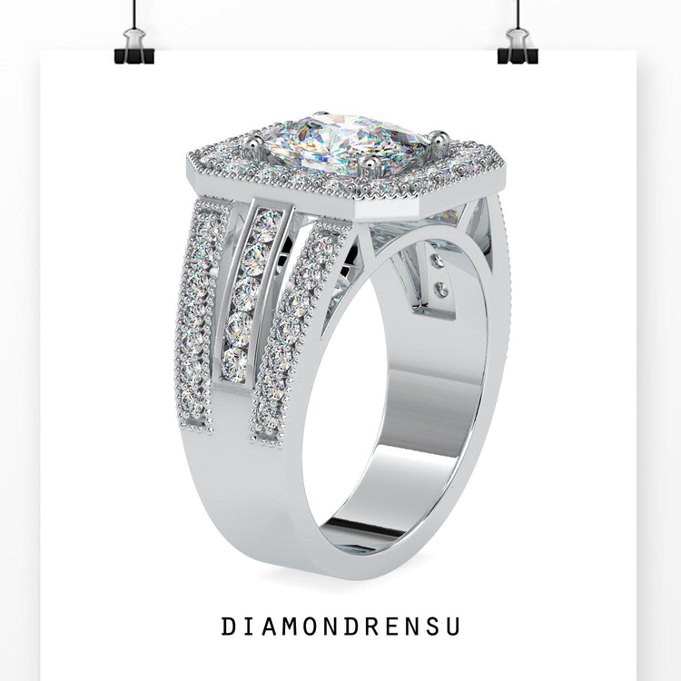 White gold engagement ring with round prongs and halo centre.