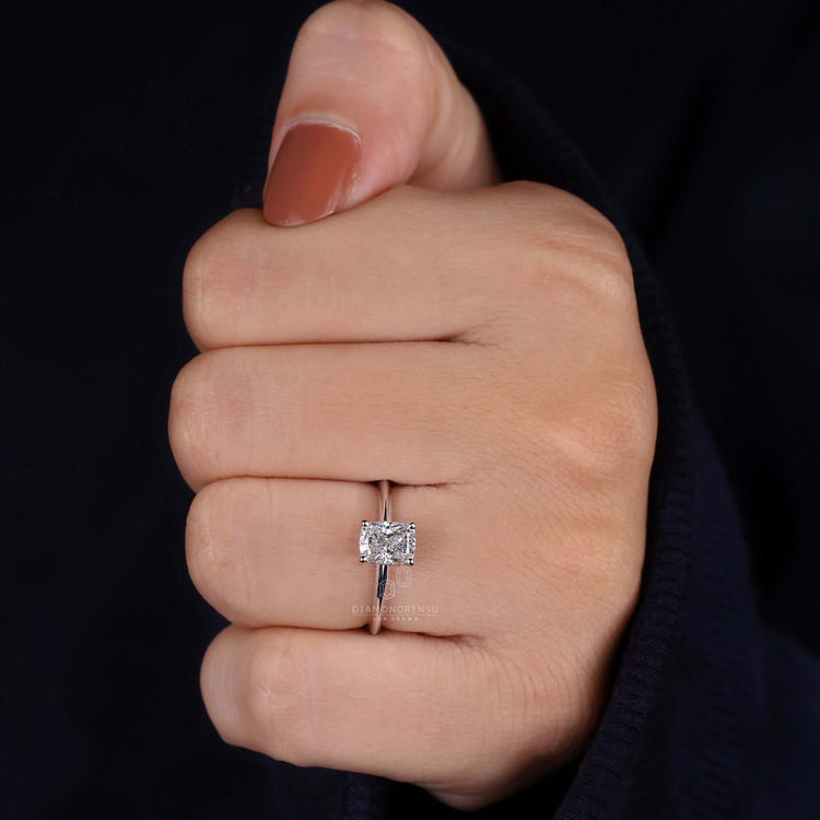 Diamond ring UK style featuring a hidden halo ring with a 4 prong setting.