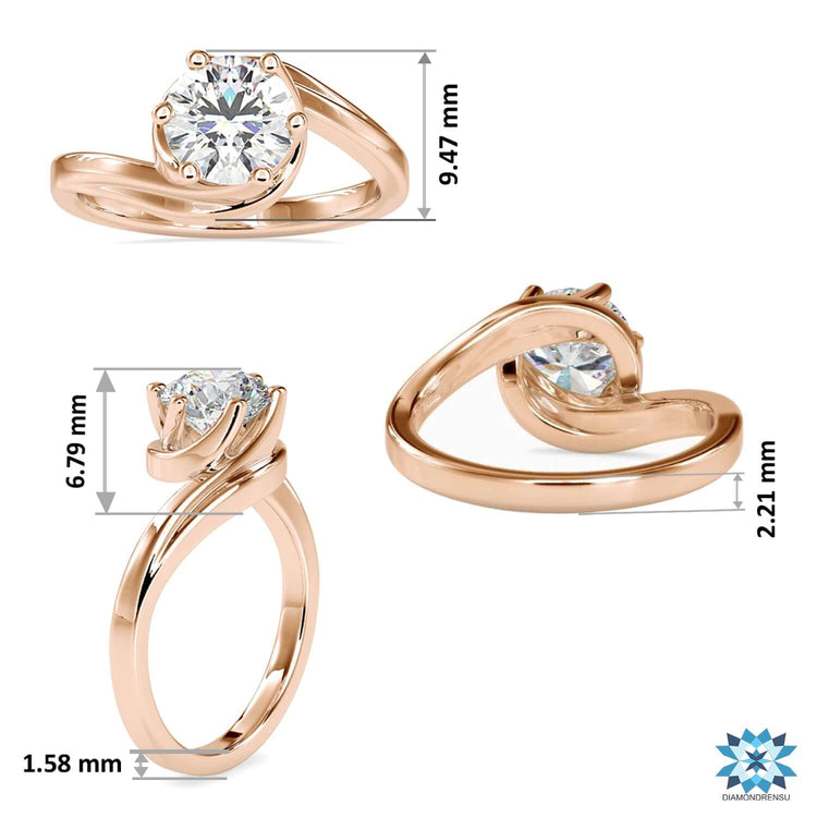 Rose gold ring with round cut diamond and 6 prongs.