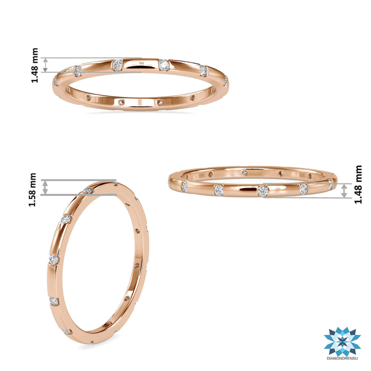 Yellow gold eternity ring with full round diamond band.
