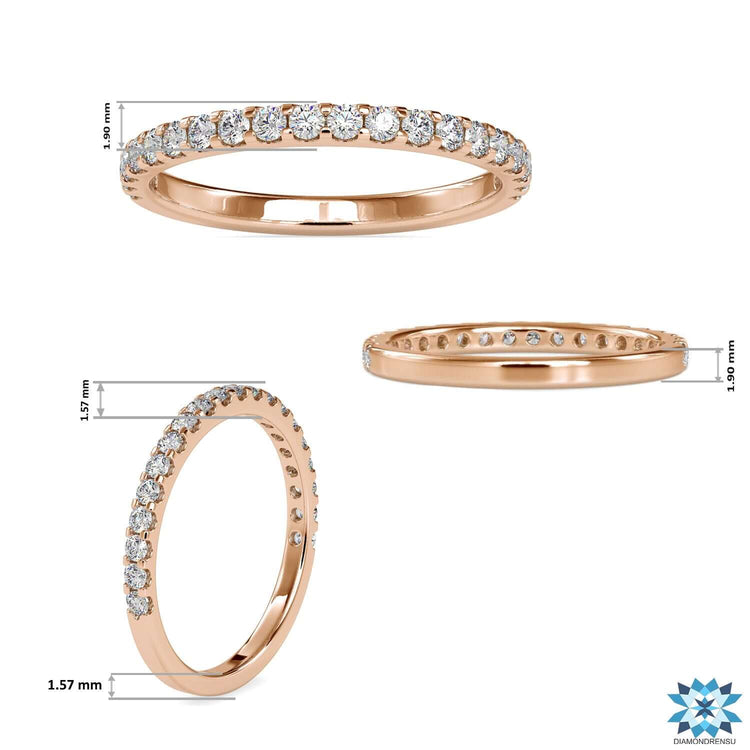 Yellow gold minimalist wedding band with round diamonds.