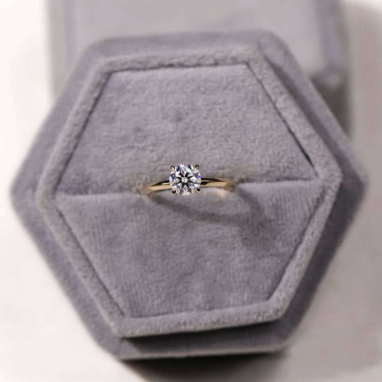 Round cut diamond in a claw prong setting, ideal for a classic solitaire diamond ring with handmade craftsmanship.