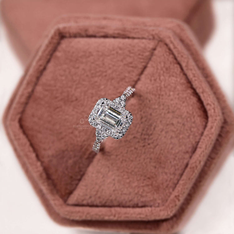 Sophisticated emerald diamond white gold ring for her.