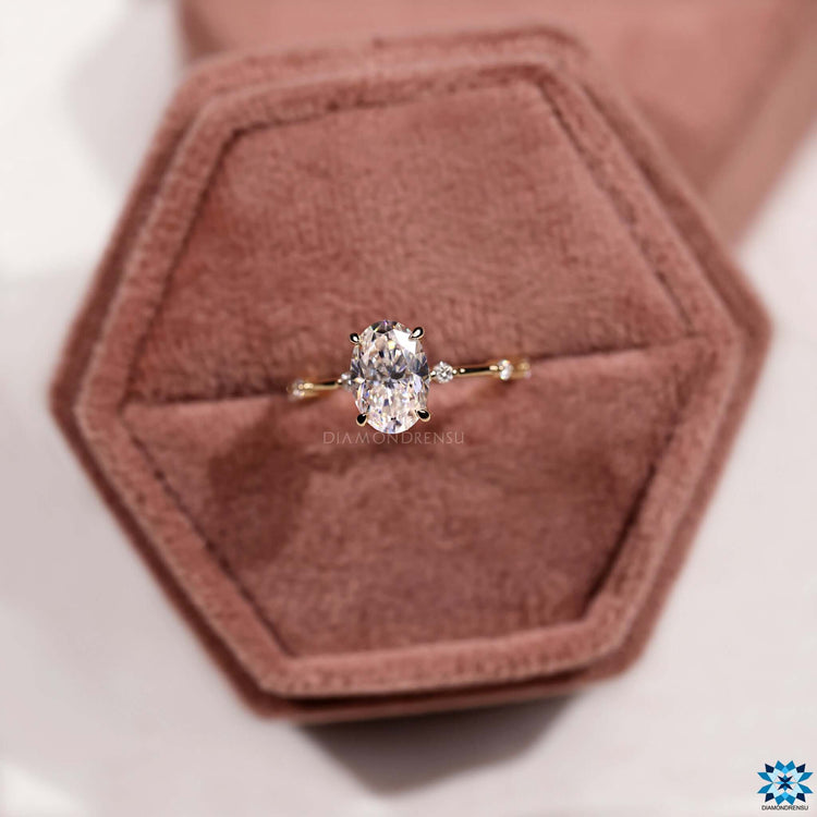 Custom engagement ring featuring oval moissanite.