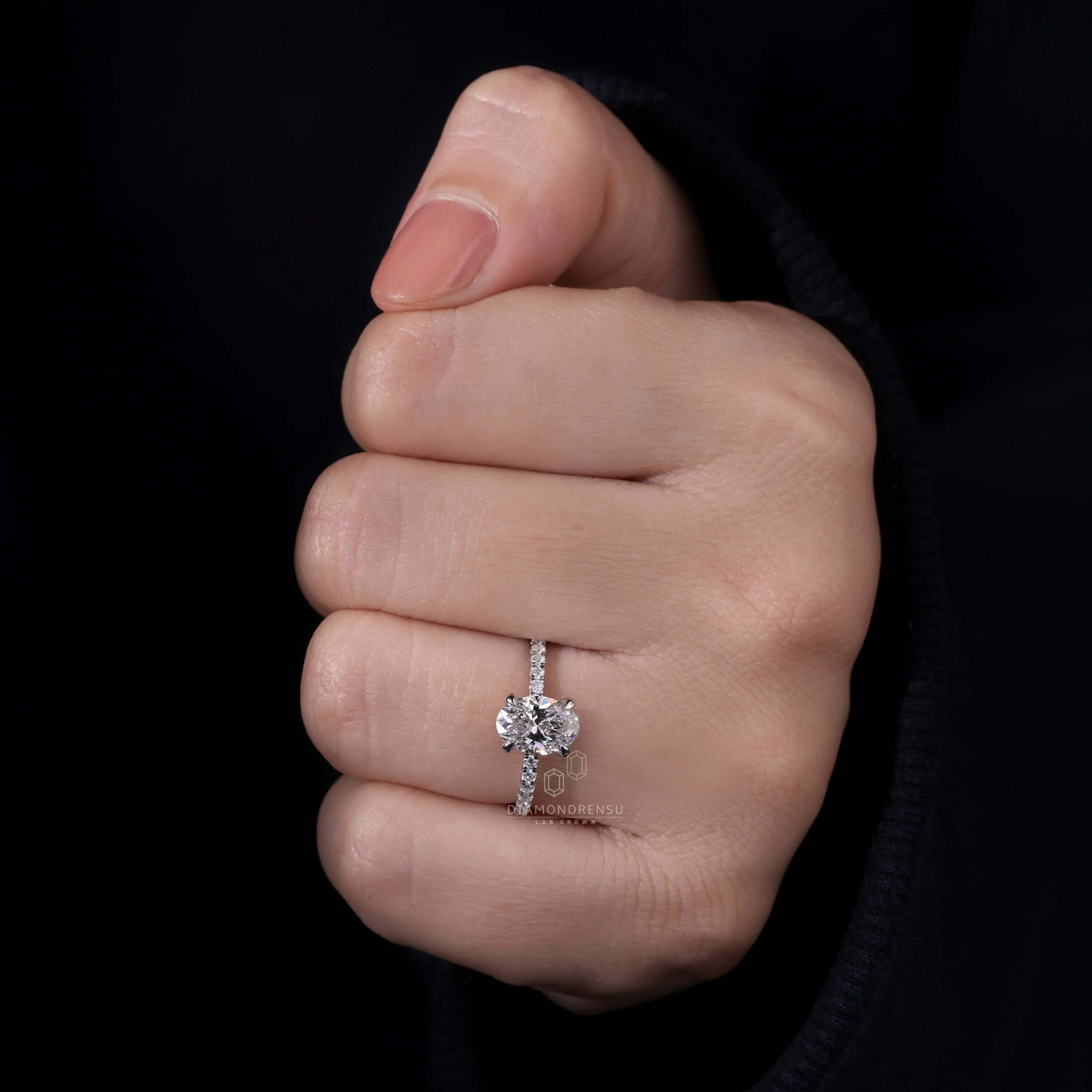 1.5 carat oval diamond ring featuring a pave band engagement ring design, crafted with Lab Grown Diamond.