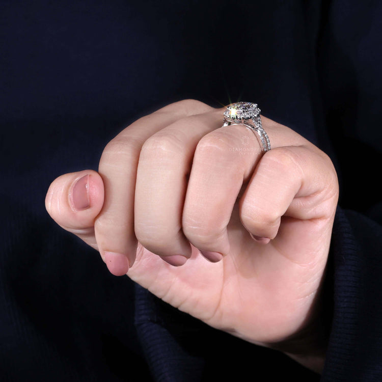 Round diamond engagement ring with a double claw prong setting.