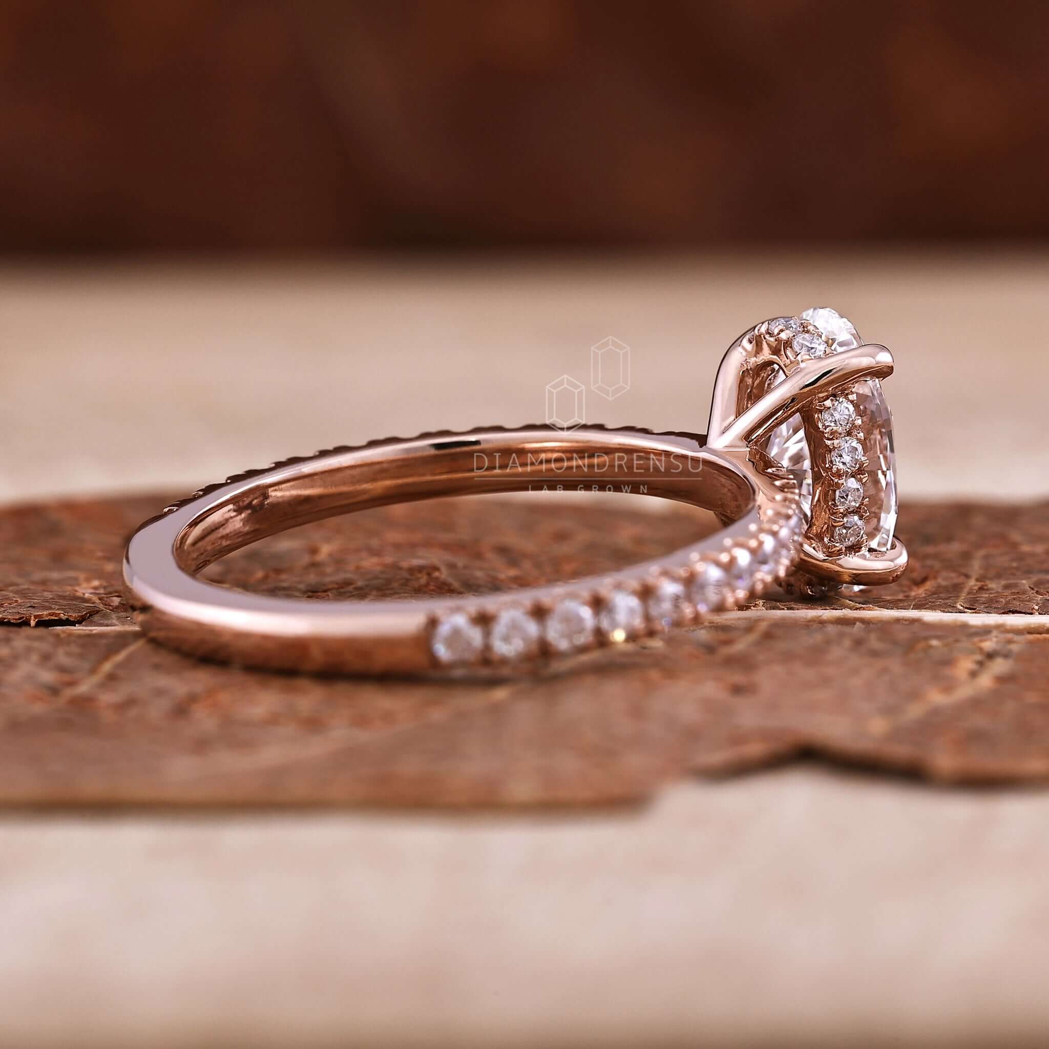 Oval cut diamond ring in a hidden halo style, expertly designed for those who appreciate handcrafted jewellery.