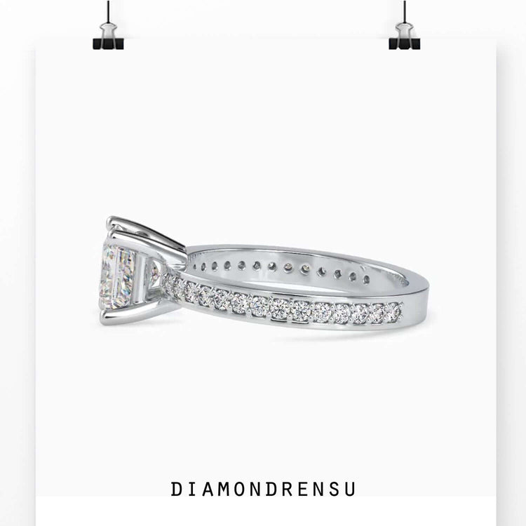 Round cut pave band with 4 prong setting in yellow gold.