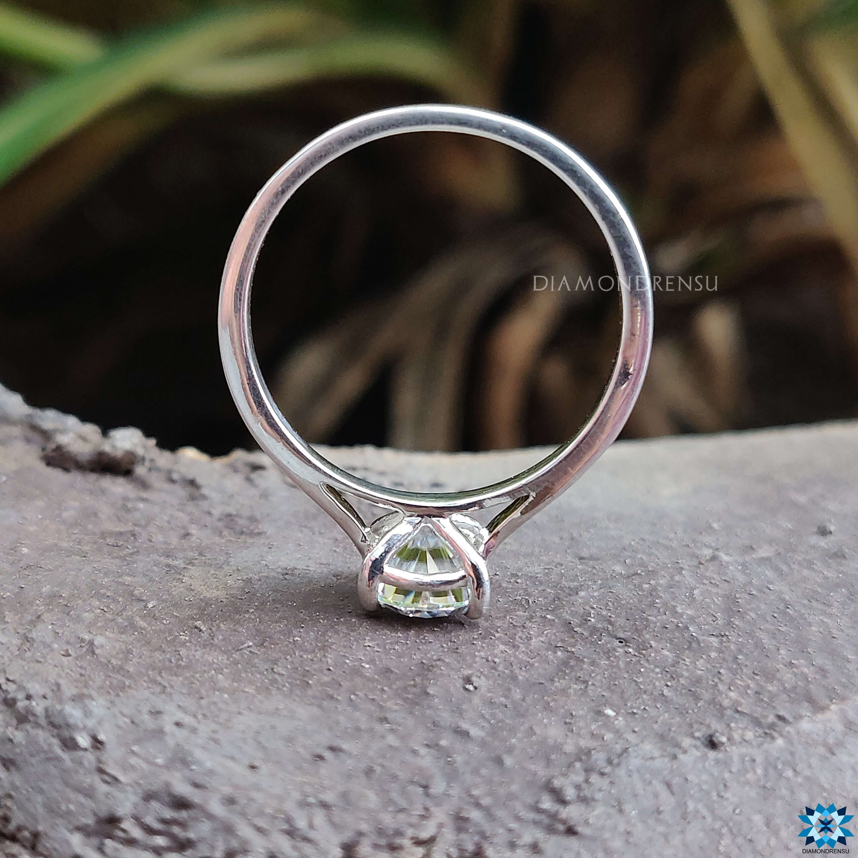 Moissanite solitaire ring in a white gold setting, perfect for engagement.