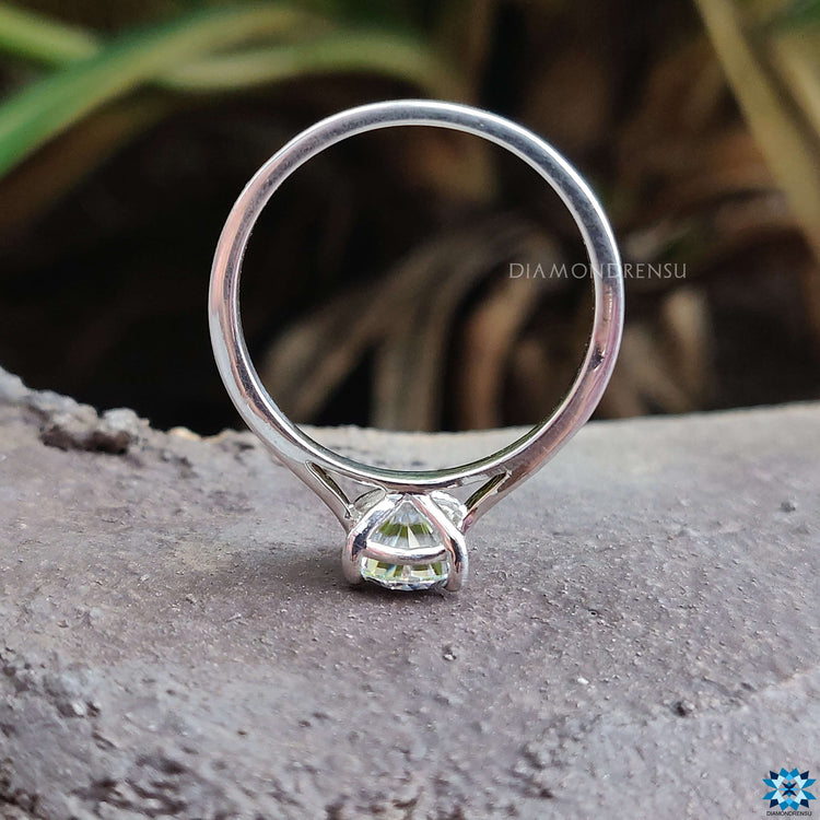 Moissanite solitaire ring in a white gold setting, perfect for engagement.