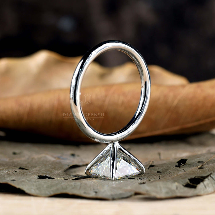 Princess diamond ring featuring a 4 prong diamond setting