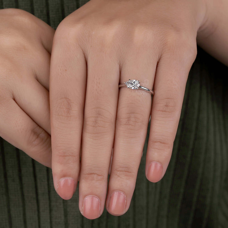 Pear diamond ring featuring a claw prong setting for elegance