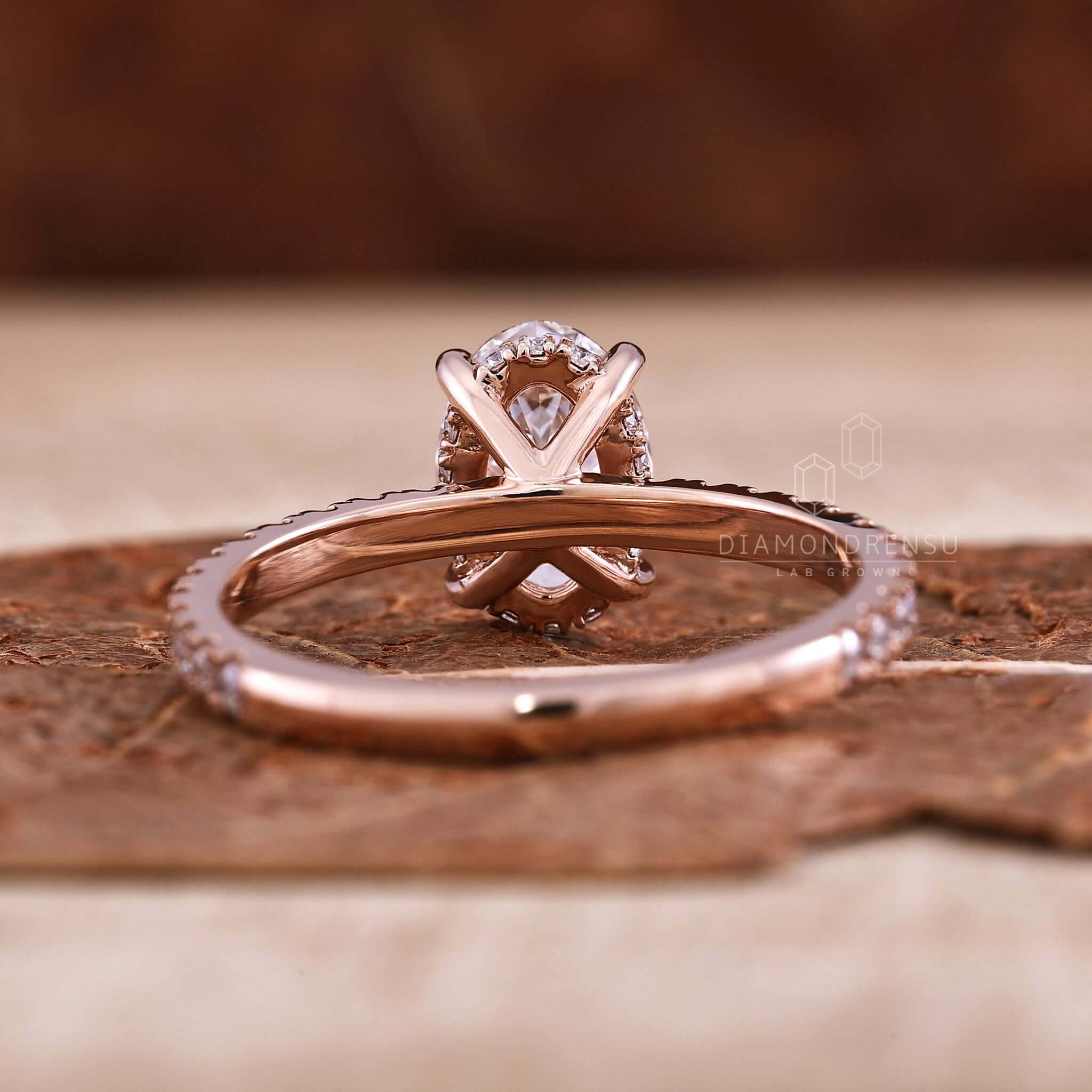 Oval hidden halo engagement ring crafted with a pave diamond ring design, ideal for proposals and special moments.