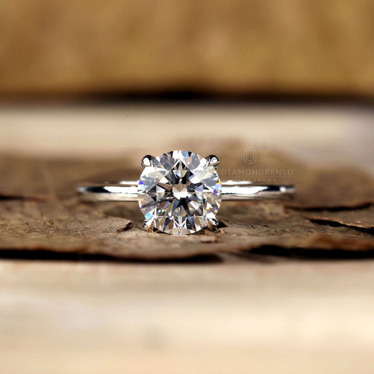 4 prong diamond ring showcasing a round brilliant cut diamond