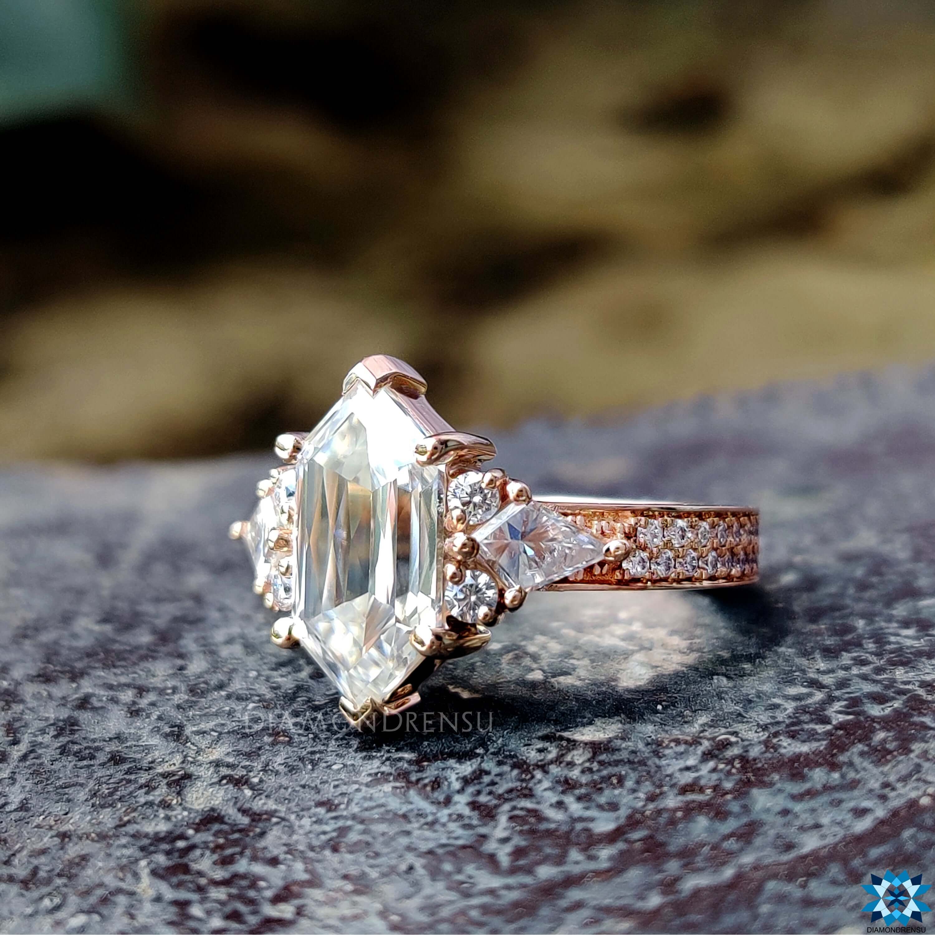 Rose gold ring with V prong setting.