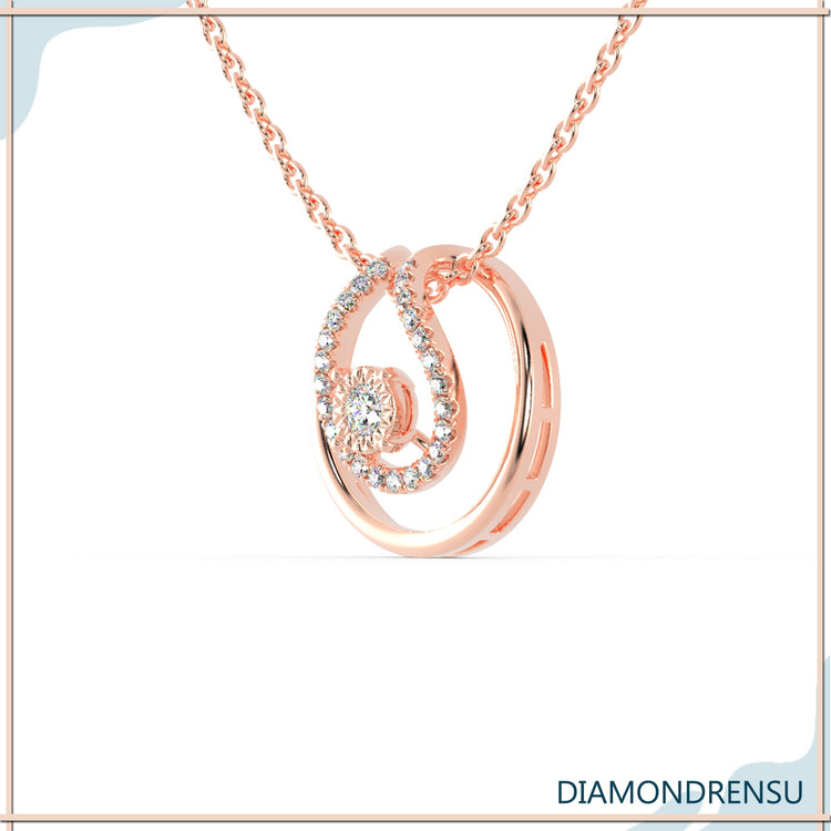 Round diamond pendant in unique open halo design, white gold.