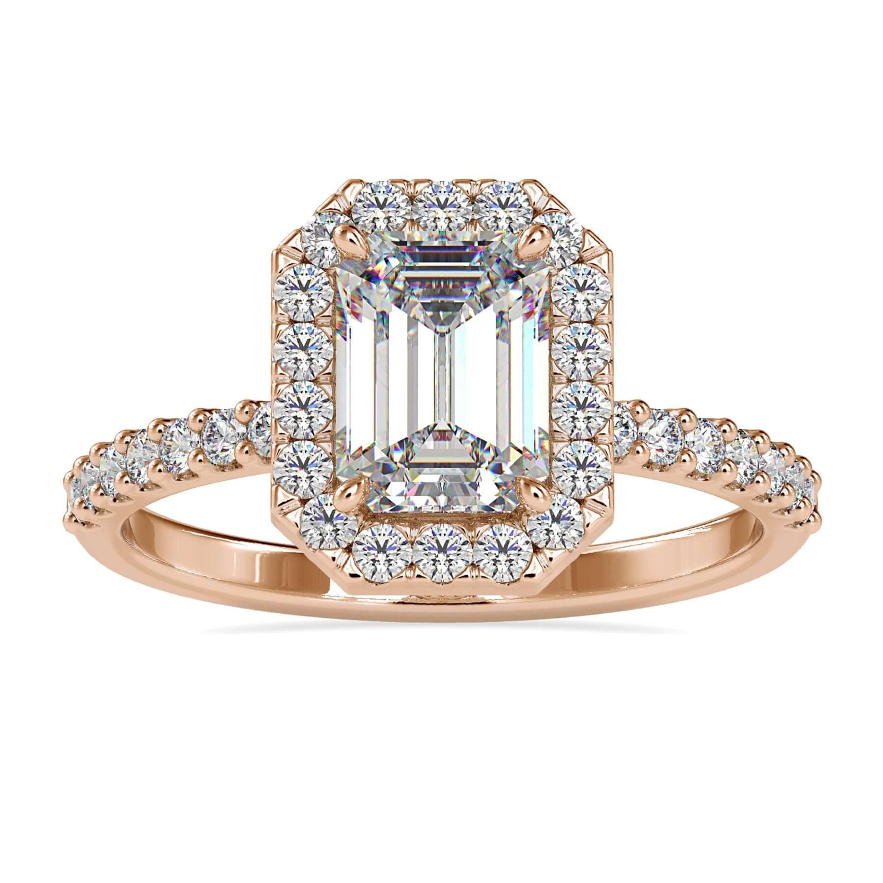 Emerald halo engagement ring with pave round cut band.
