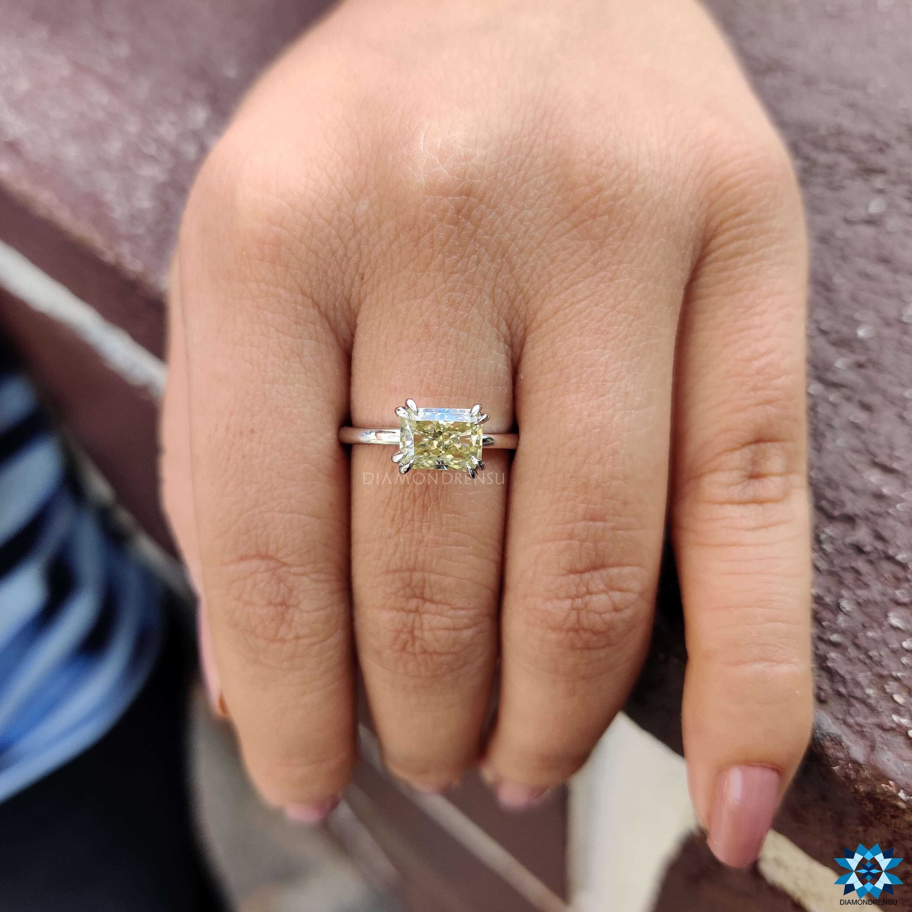 Handmade jewellery ring with radiant cut moissanite.