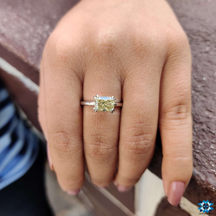 Handmade jewellery ring with radiant cut moissanite.