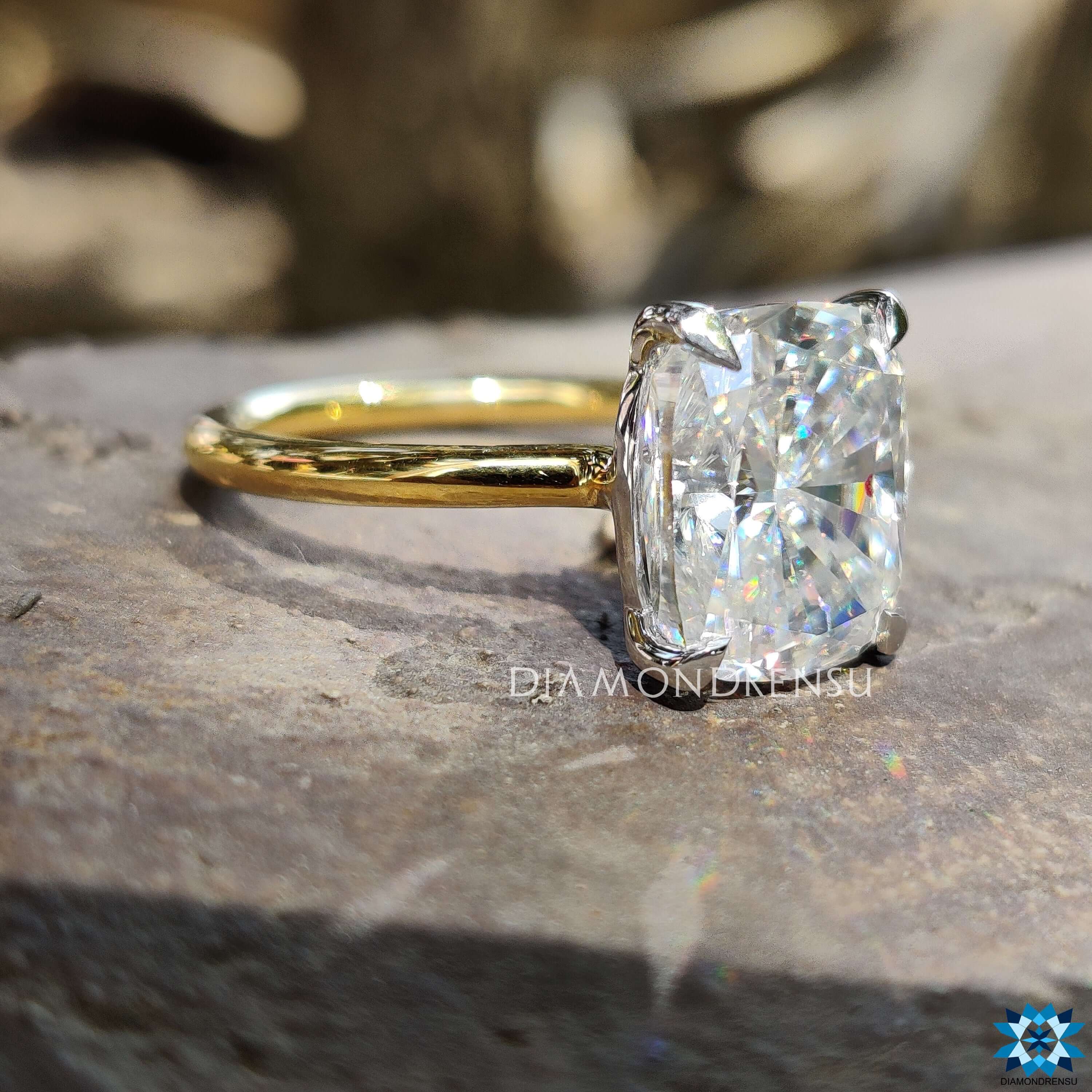 Handmade moissanite ring with four prong setting.