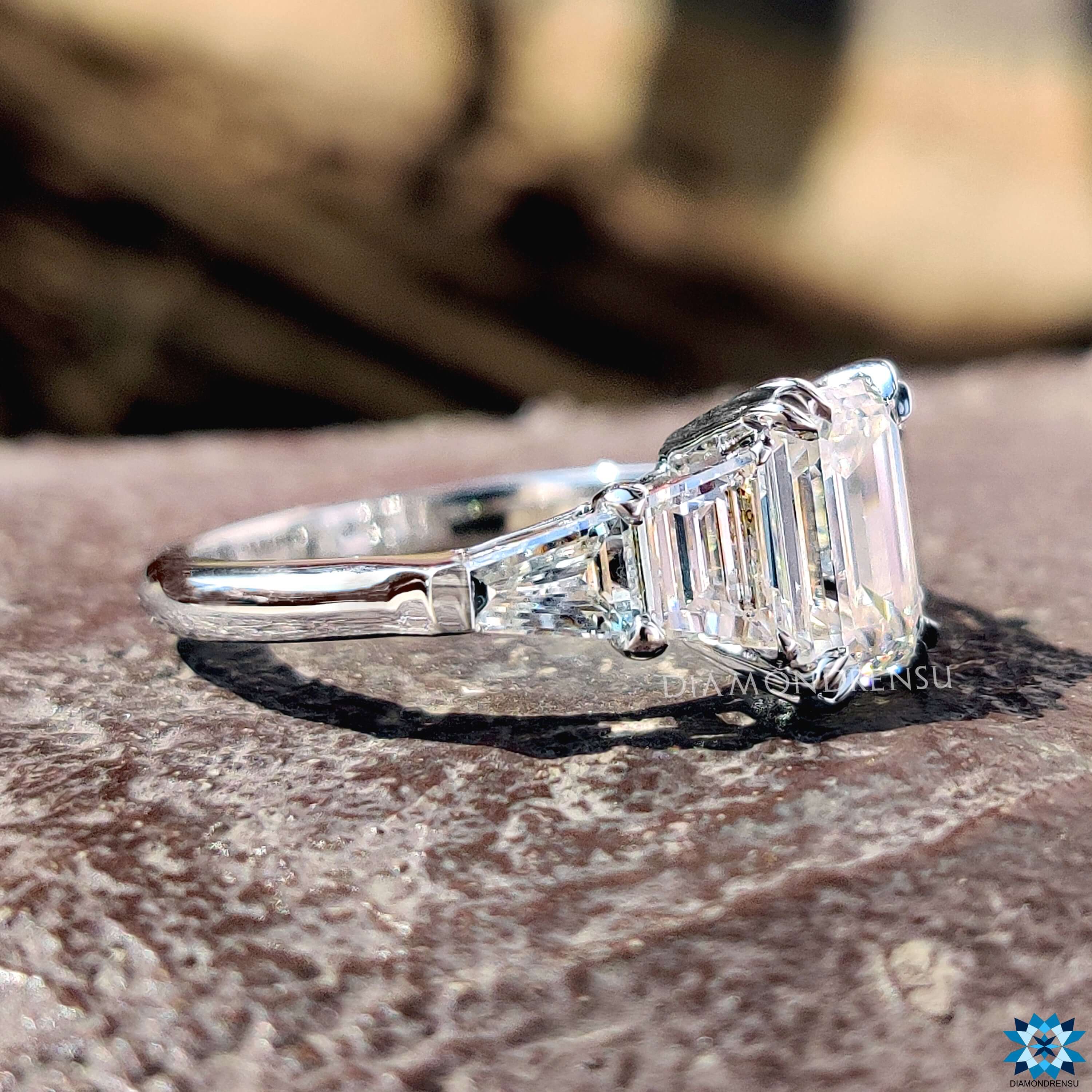 White gold 5 stone engagement ring with prong setting.