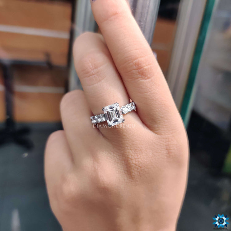 Handmade moissanite ring with hidden halo design.