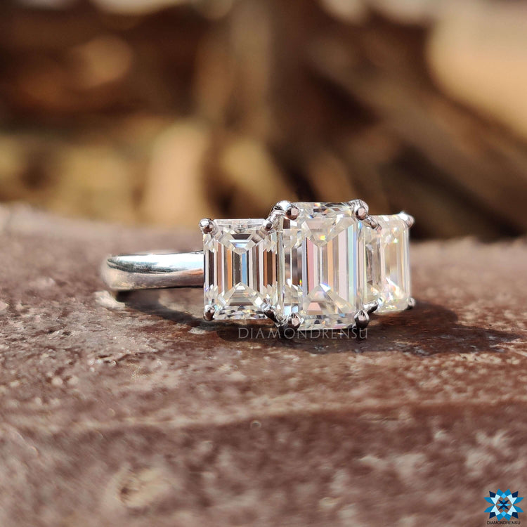 Custom three stone engagement ring in prong setting.