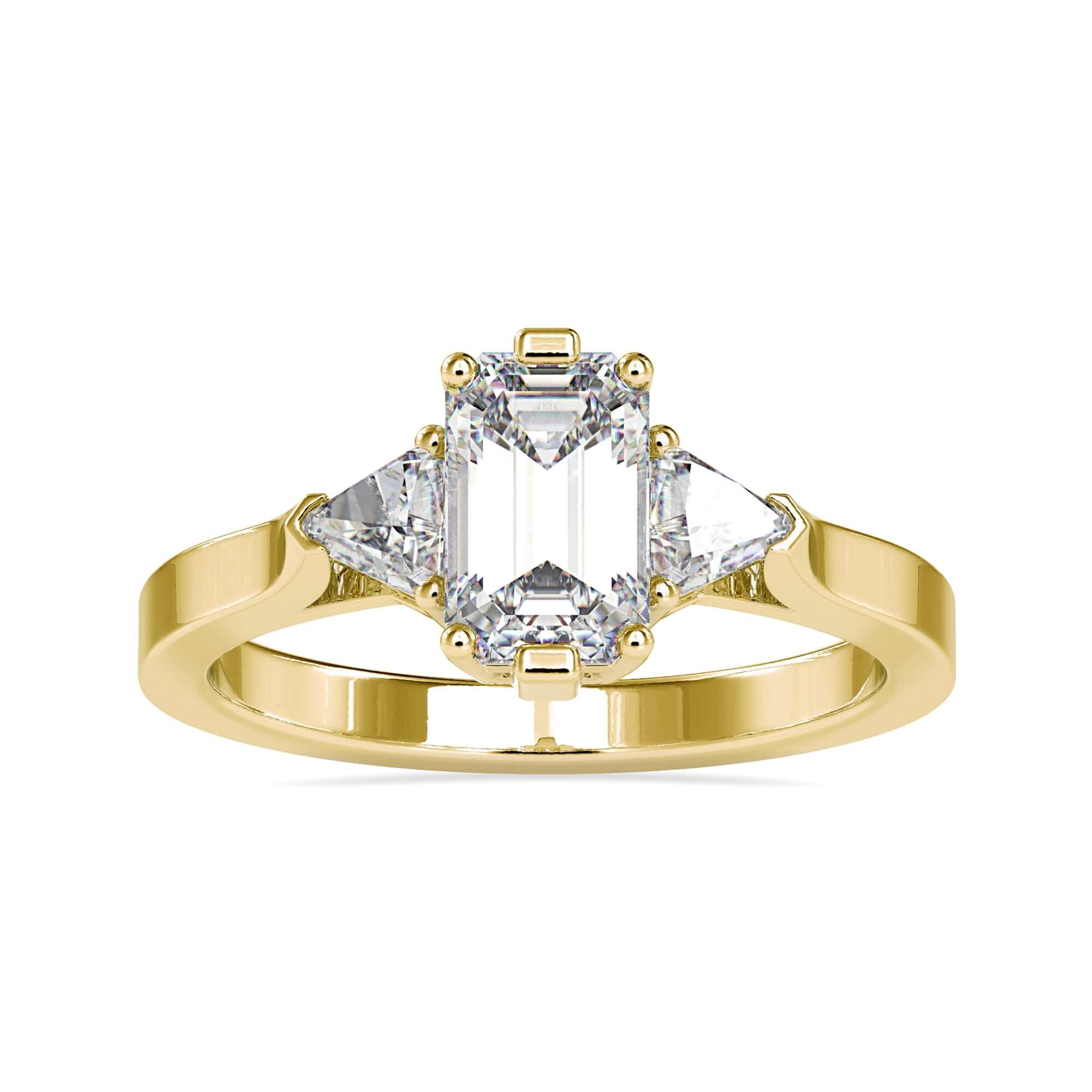 Yellow gold ring with emerald cut diamond and trillions.