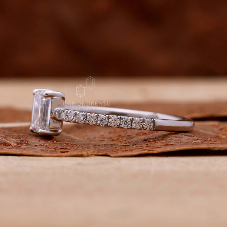 Sparkling emerald cut diamond ring with exceptional brilliance.