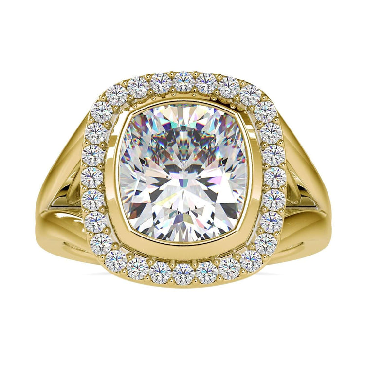 Cushion cut lab grown diamond engagement ring in halo setting.
