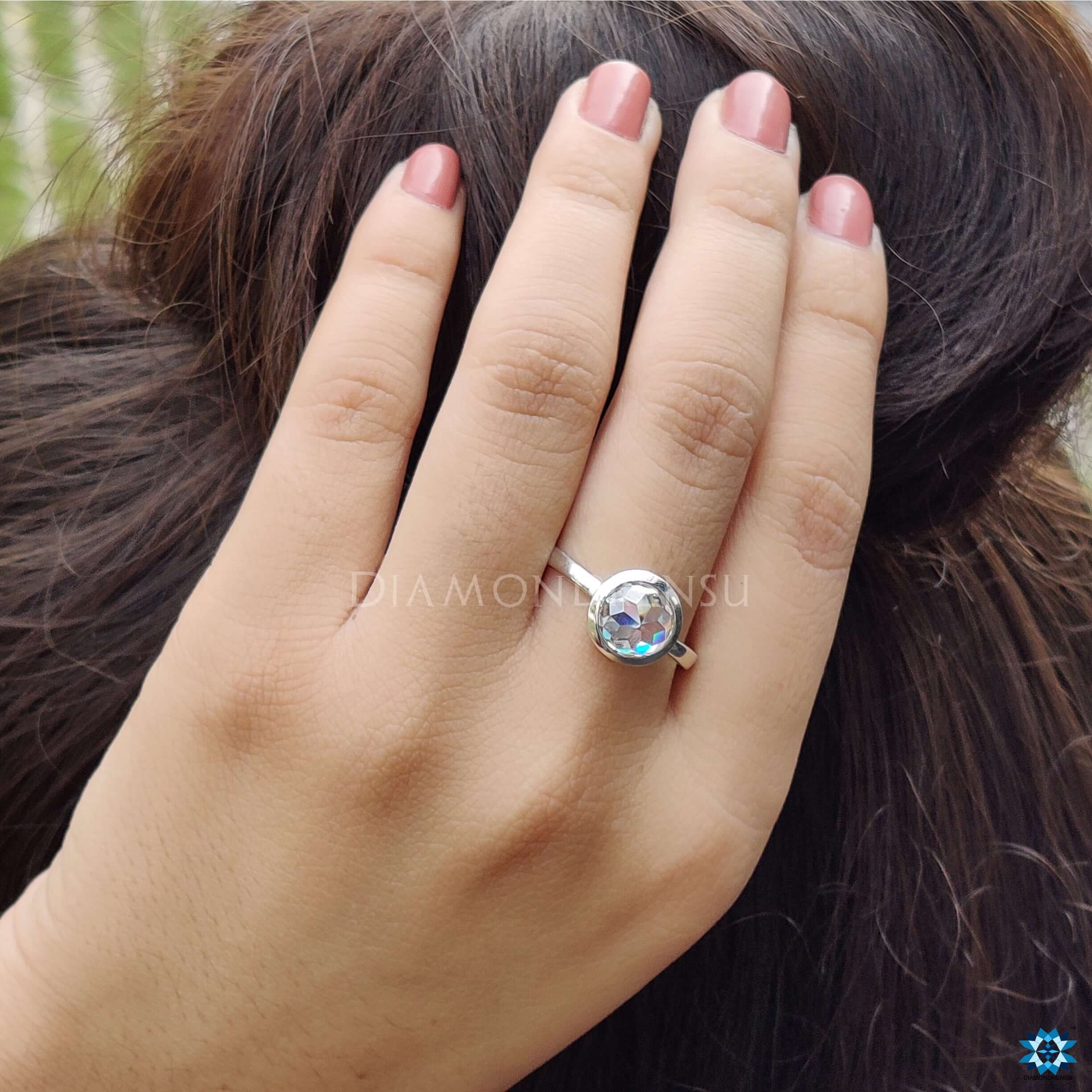 Handmade round rose cut Moissanite ring with bezel setting and white gold finish.