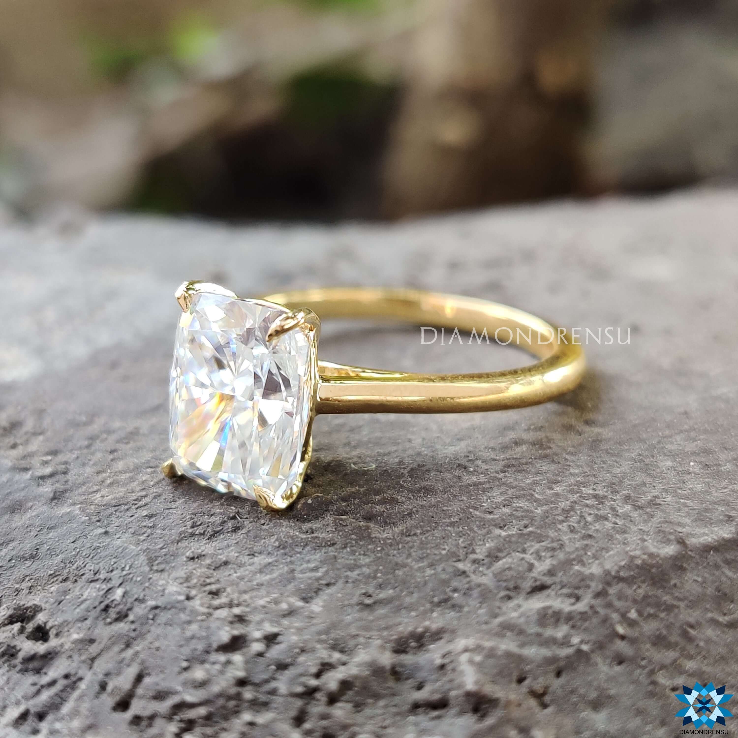 Elegant cushion cut ring set in a 4 prong claw setting.