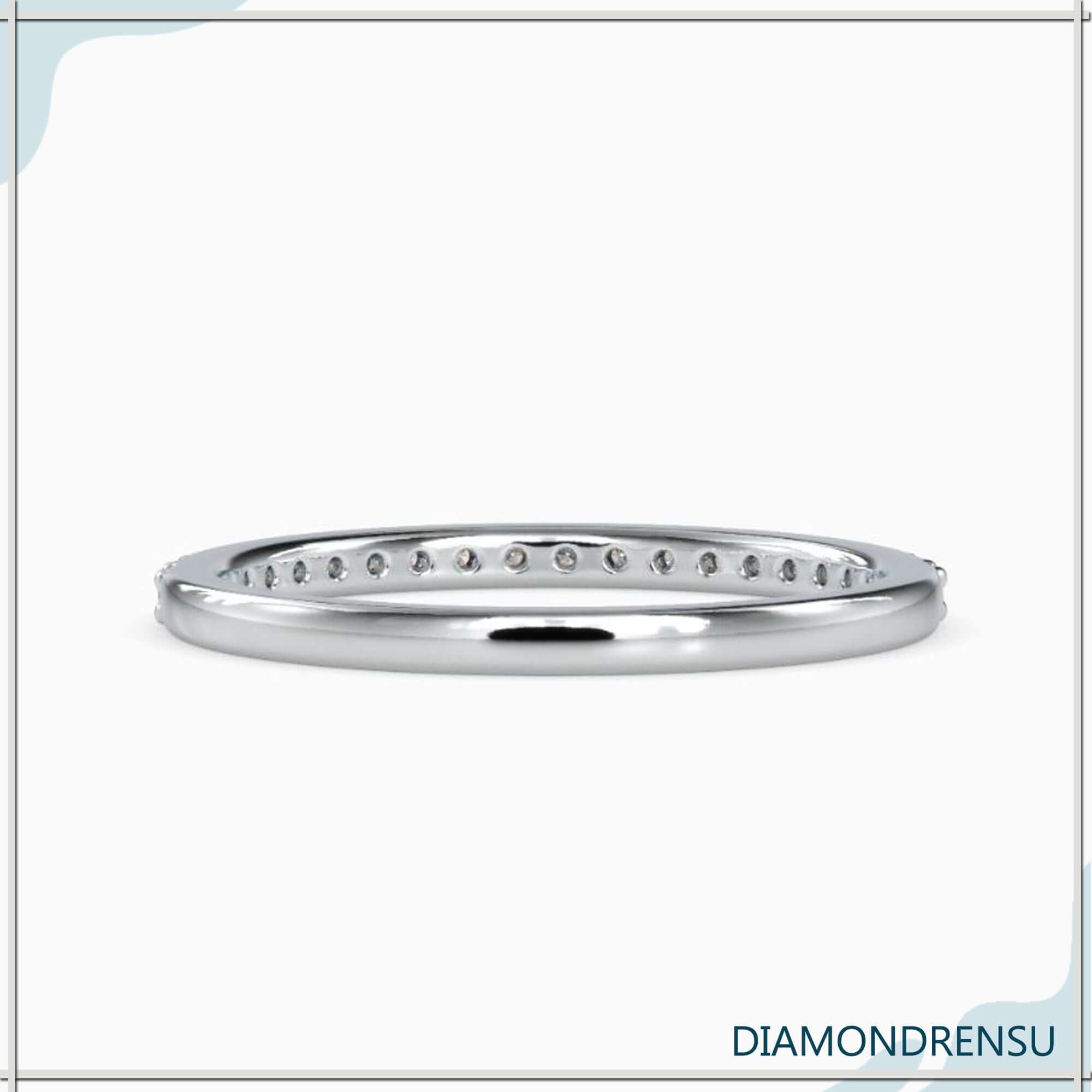 Lab grown diamond ring in stackable yellow gold band.